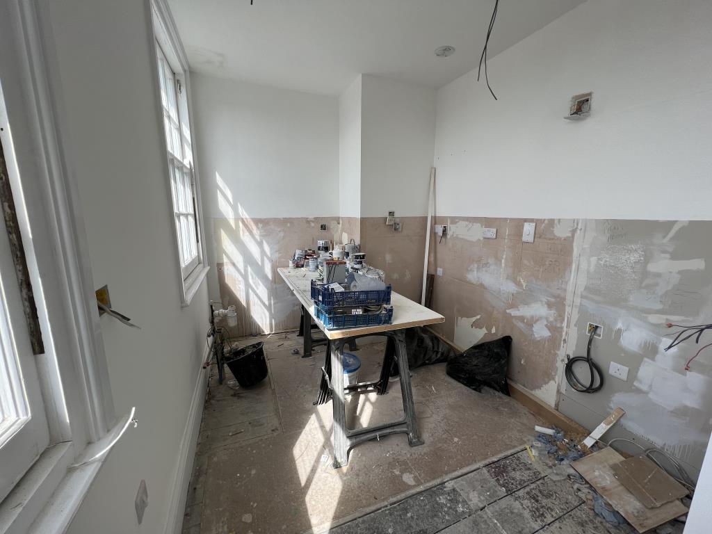 Lot: 76 - PARTIALLY REFURBISHED STUDIO FLAT FOR COMPLETION - Internal photo of the kitchen area
